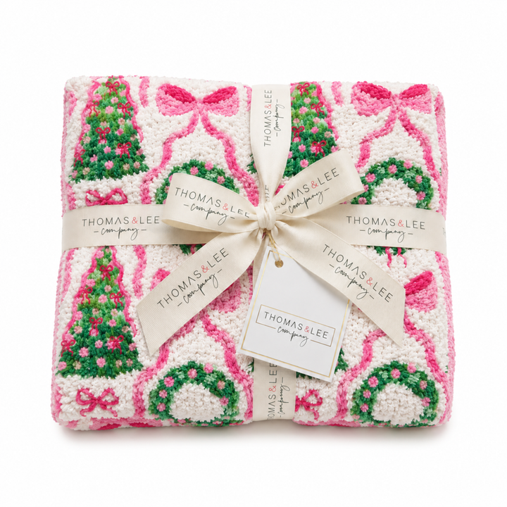 Thomas and Lee soft blanket in pink and white with candy cane, hearts, and tree icons.