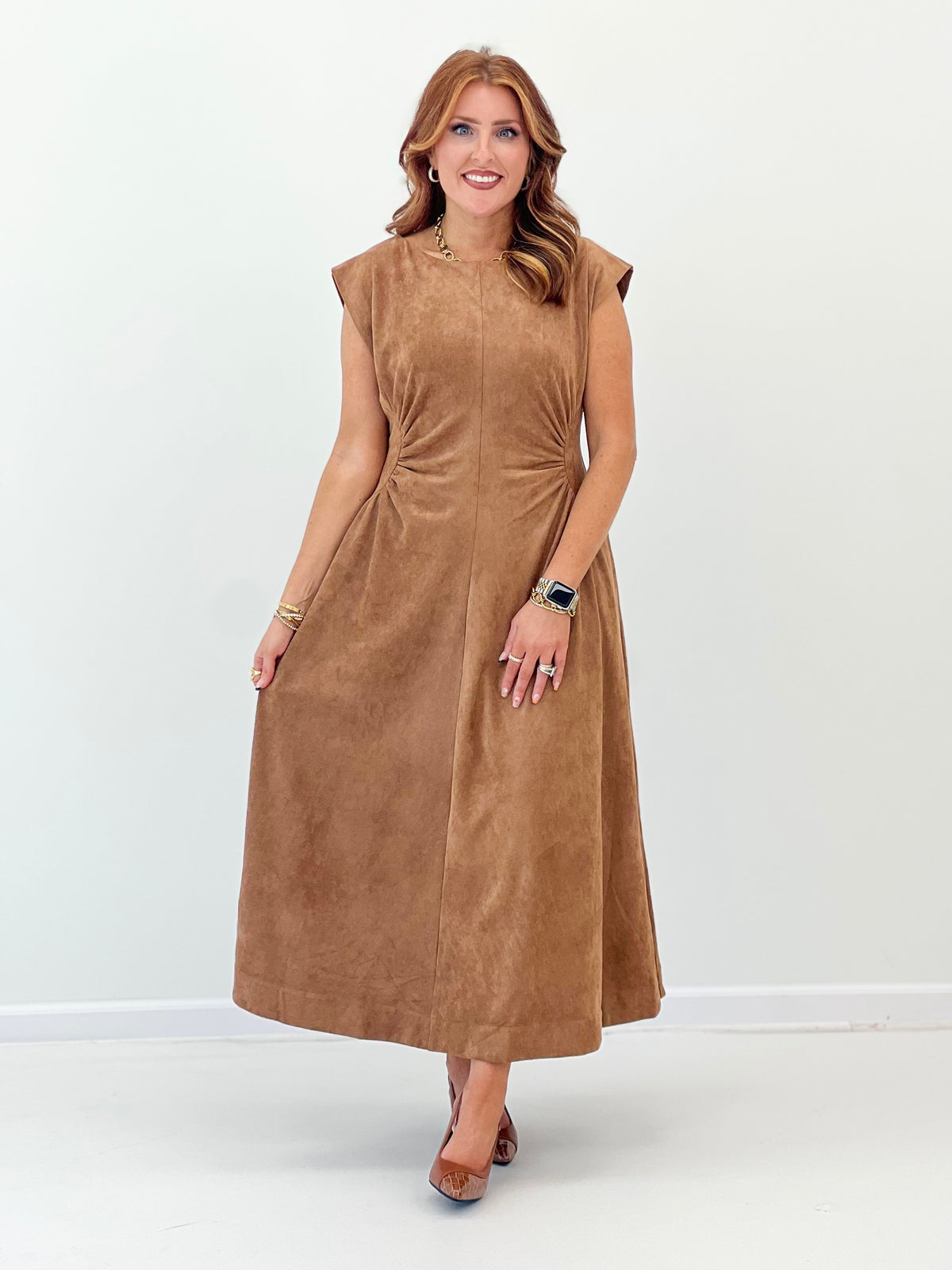 Mocha faux suede midi dress with sleeveless cut and side panels