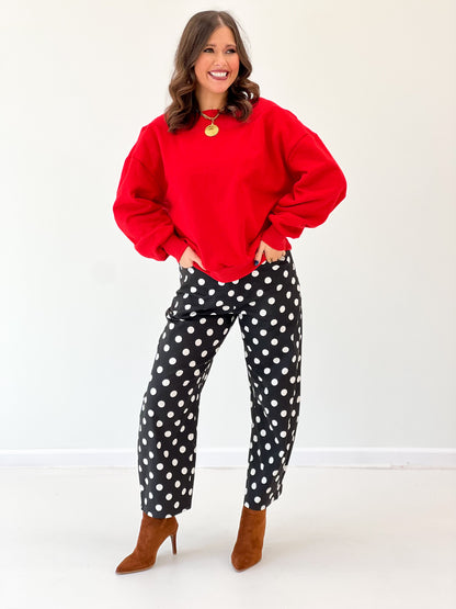 Red off-shoulder sweatshirt with wide neckline and cuffed long sleeves