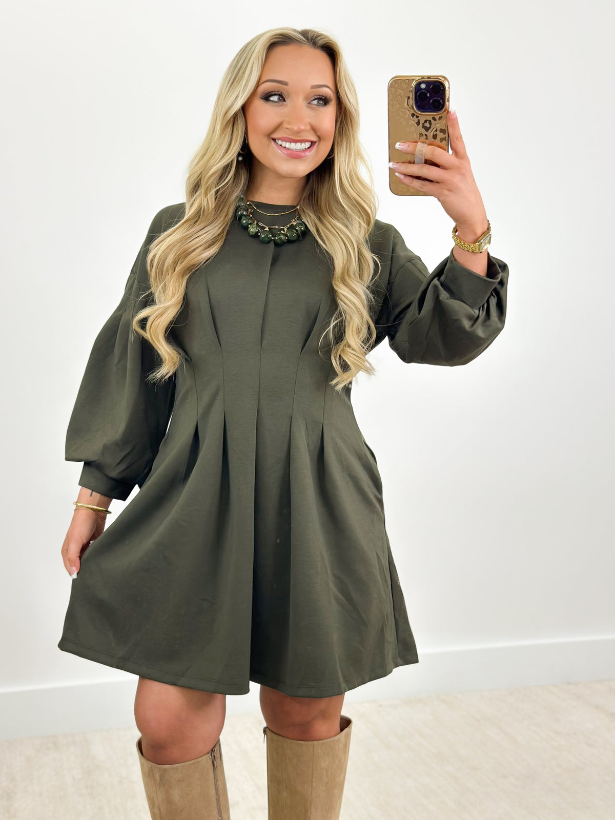 Olive long-sleeve pleated-waist dress with gathered skirt and crew neck