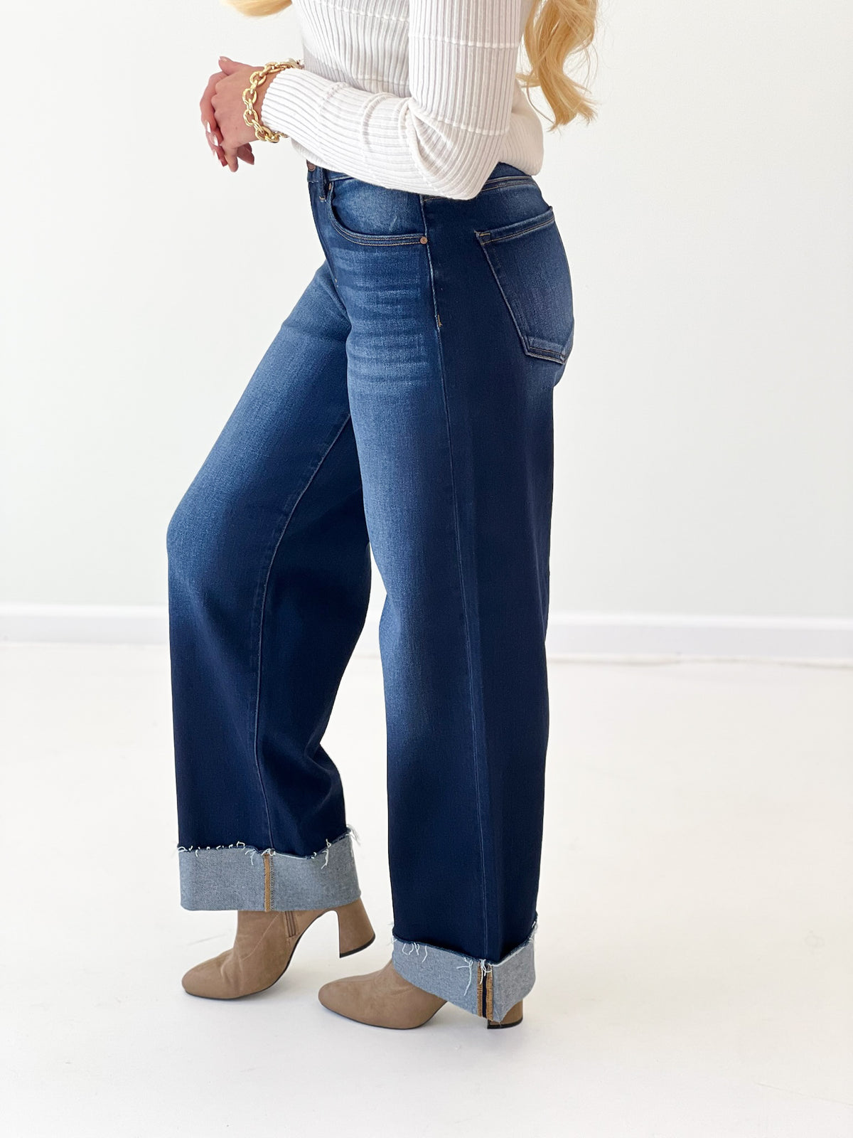Deep blue slouchy barrel jeans with cuffed hem and side pockets