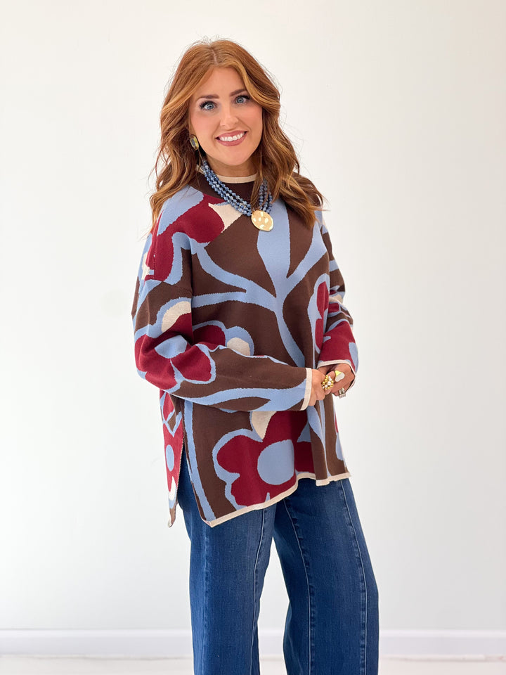 Floral print long-sleeve sweater top with crew neck and multicolor abstract flowers