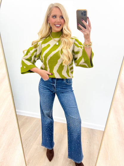 Olive abstract print sweater top, ribbed mock neck and batwing sleeves