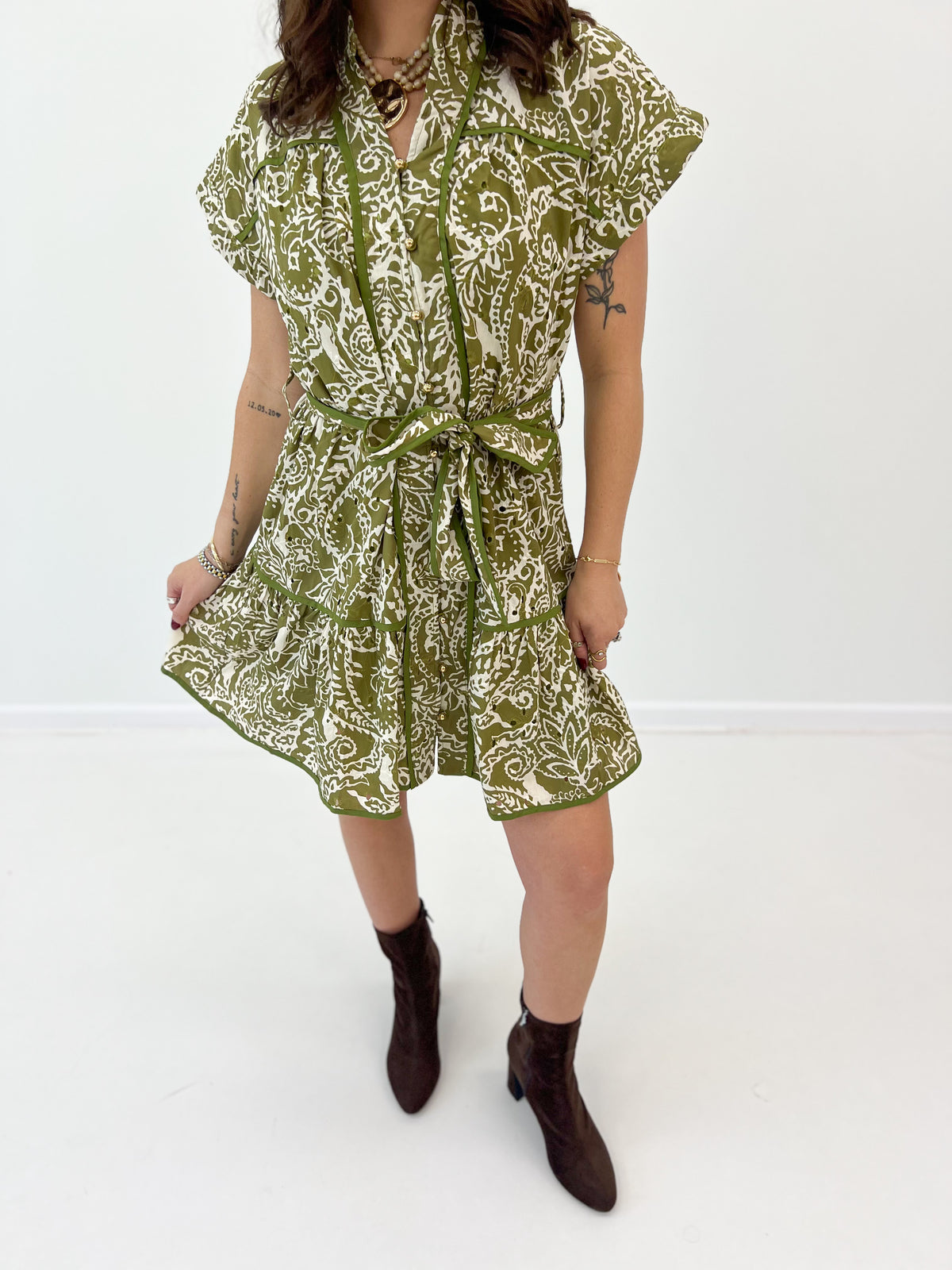 Olive printed tiered shirt mini dress with belt, short sleeves, ruffled skirt