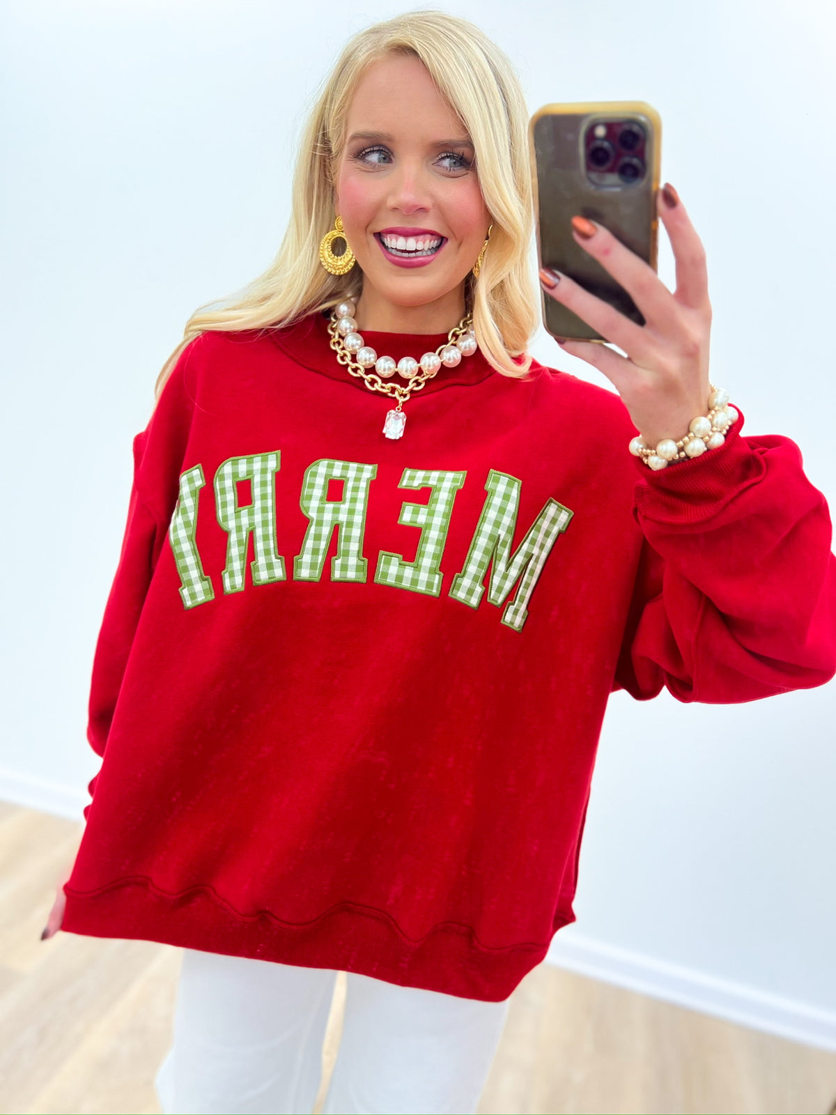 Red mock-neck Christmas sweatshirt with embroidered MERRY text across the front