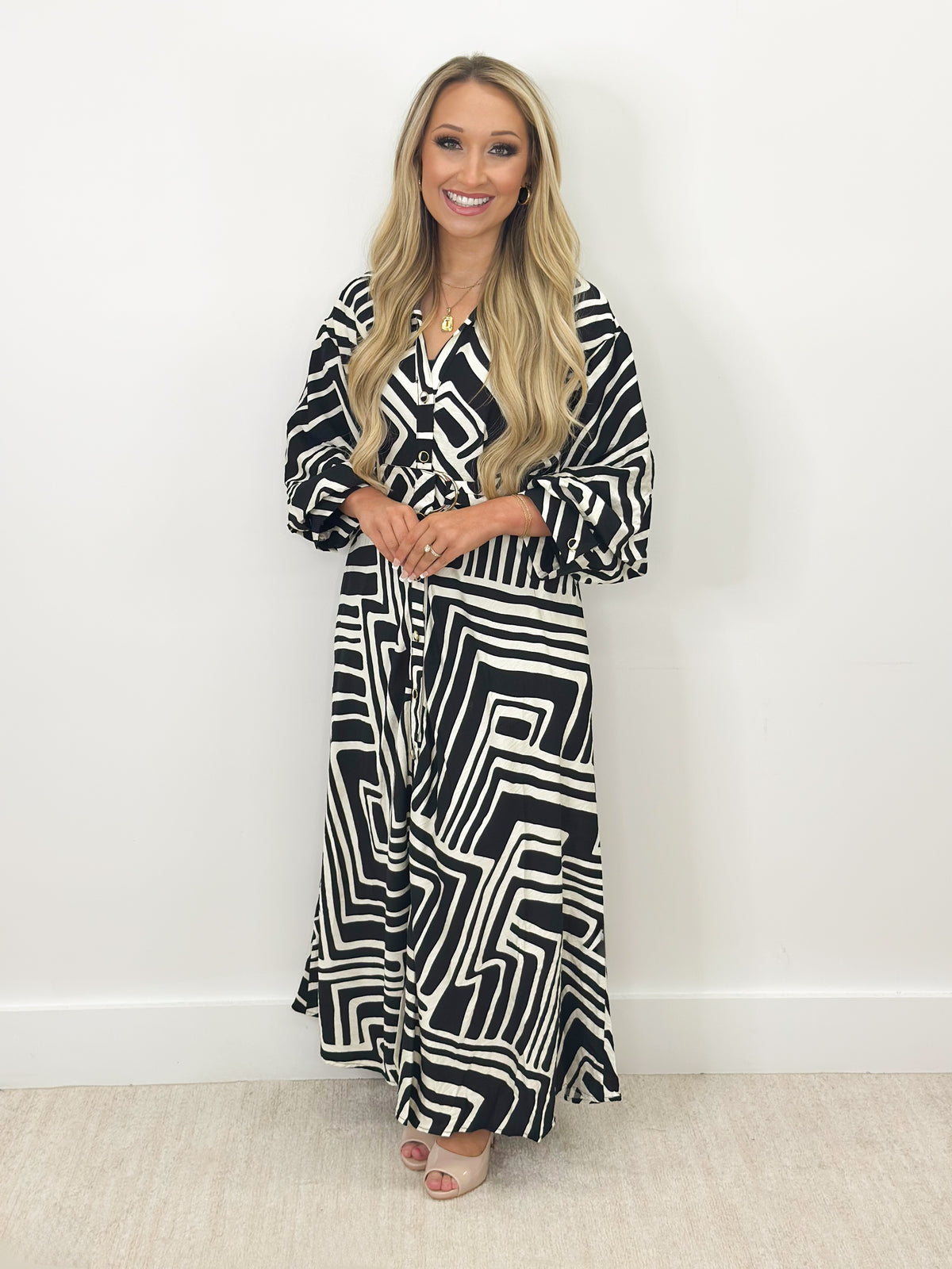 Collared button-down tie dress detail, V collar, button front, geometric print