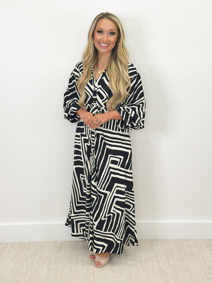 Collared button-down tie dress detail, V collar, button front, geometric print