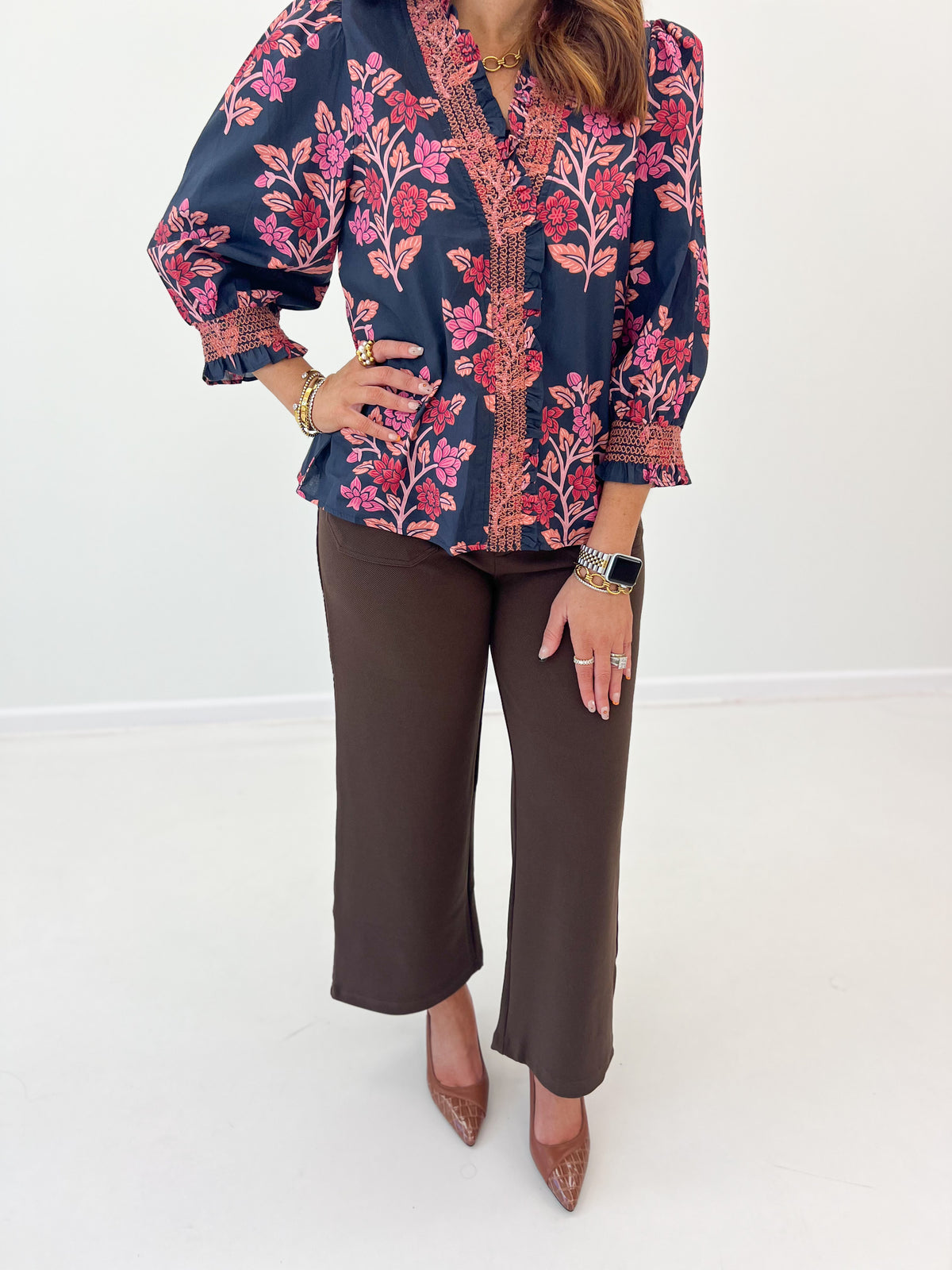 Navy floral smocked ruffle puff sleeve top, button front