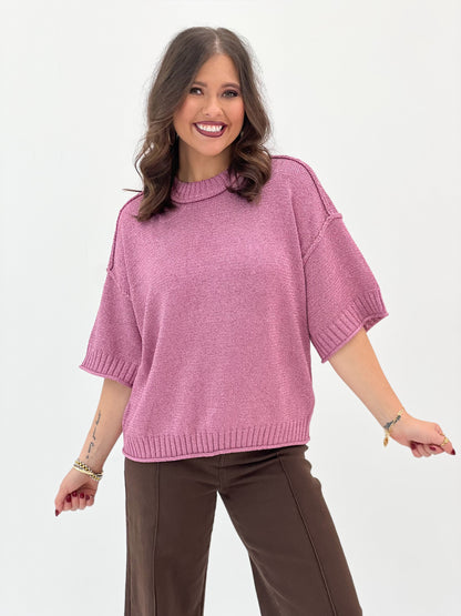 Pink metallic lurex sweater with mock neck and ribbed short sleeves, relaxed fit