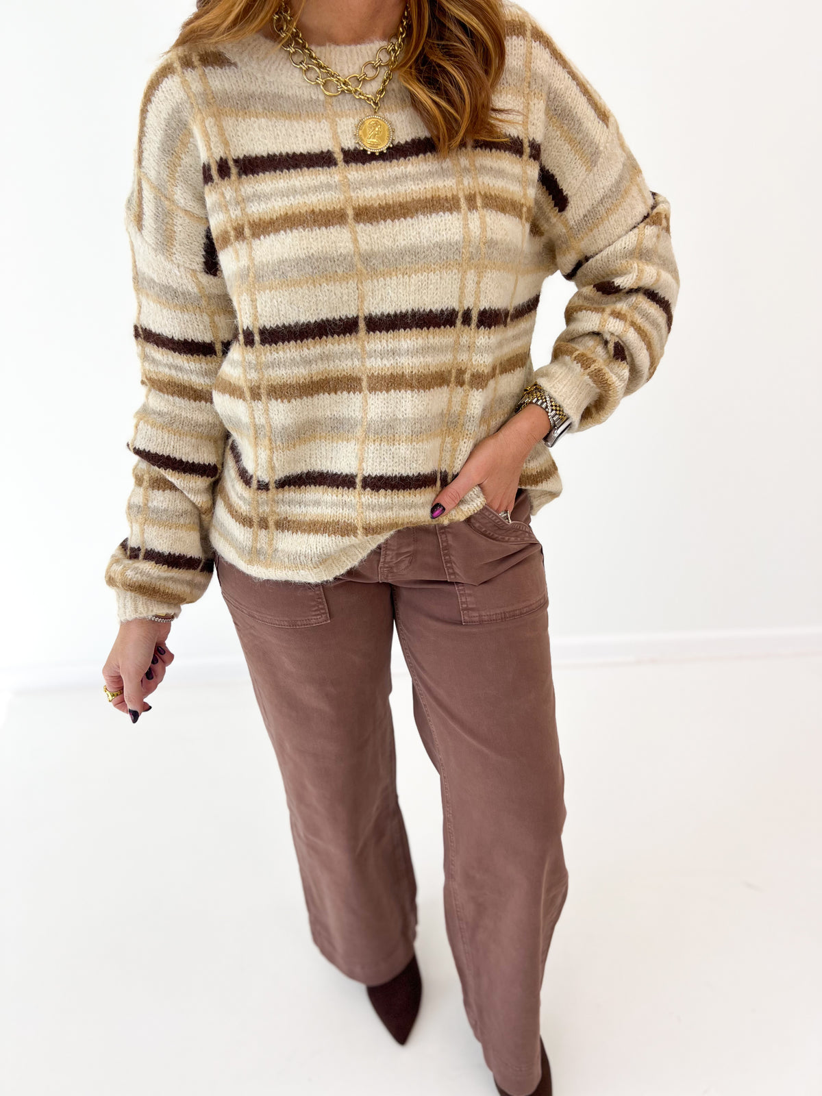 Cream and camel plaid crew neck sweater with long sleeves