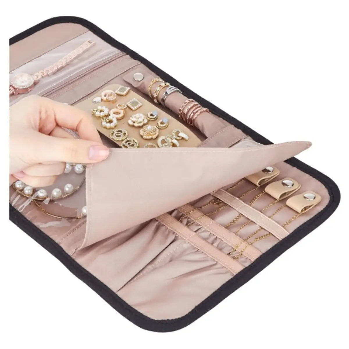 Open jewelry organizer roll showing ring straps, earring panel and clear storage pockets