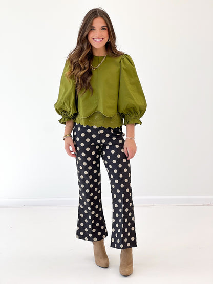 Olive green balloon sleeve lace-trim top with scalloped hem and scoop neckline