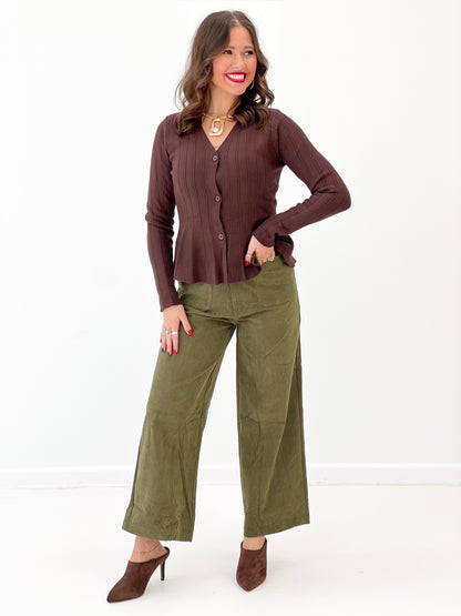 Olive corduroy wide-leg pants with front seam detail and roomy straight legs