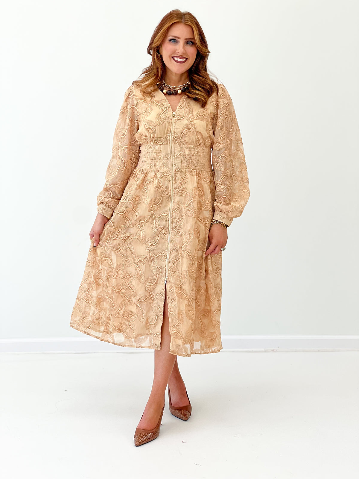 Latte sheer textured smocked-waist midi dress with long sleeves and button-front detail