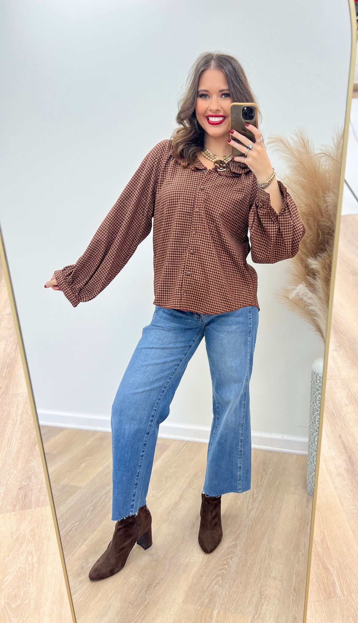 Burgundy plaid blouse with ruffle collar and long sleeves