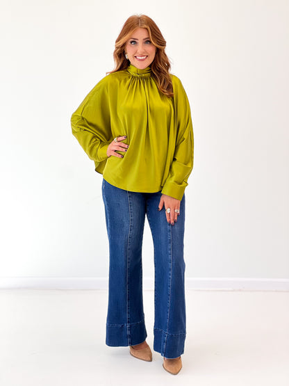 Lime green satin-effect tie-back blouse with long balloon sleeves