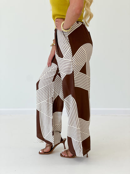 Brown and white patchwork stripe wide-leg pants with elastic back waistband