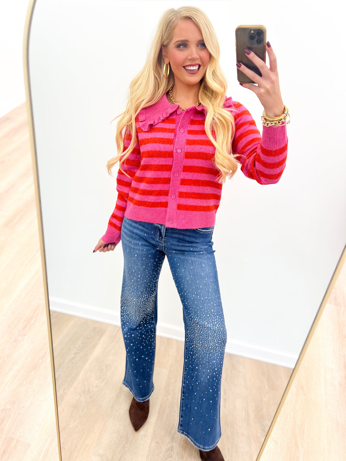 Hot pink striped sweater cardigan with ruffled collar and button-front, long sleeves