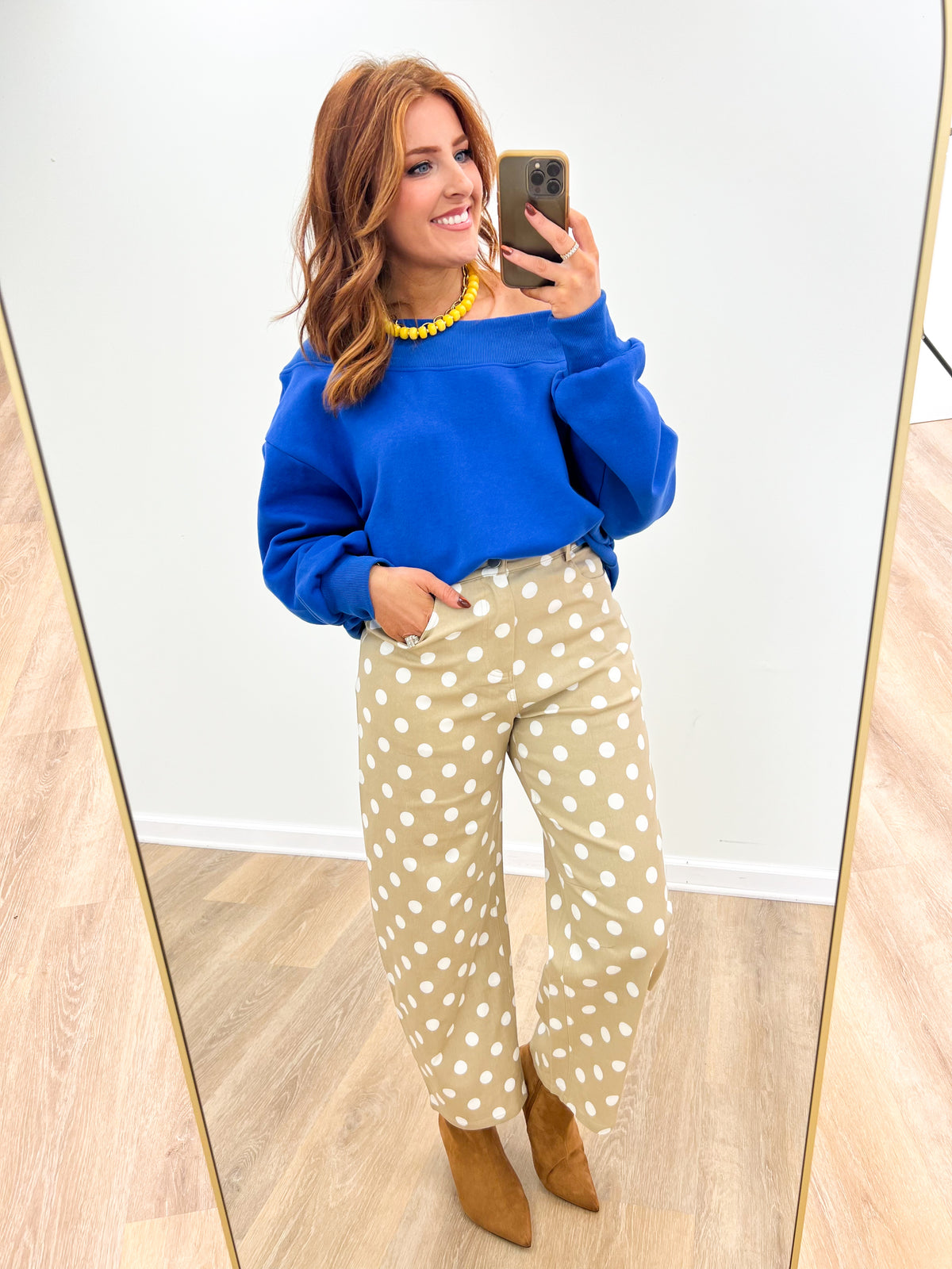 Blue off-shoulder sweatshirt with draped neckline and long sleeves