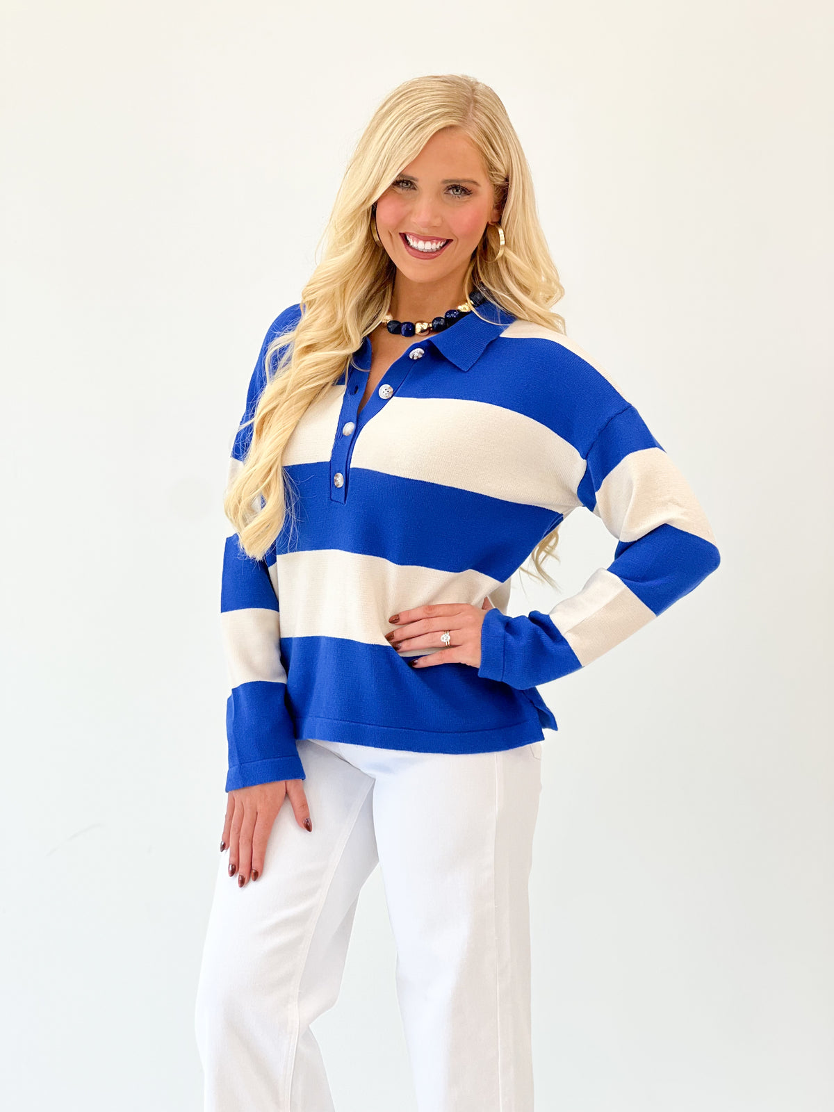Blue and cream striped collared button-up sweater with buttoned front, long sleeves