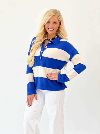 Blue and cream striped collared button-up sweater with buttoned front, long sleeves