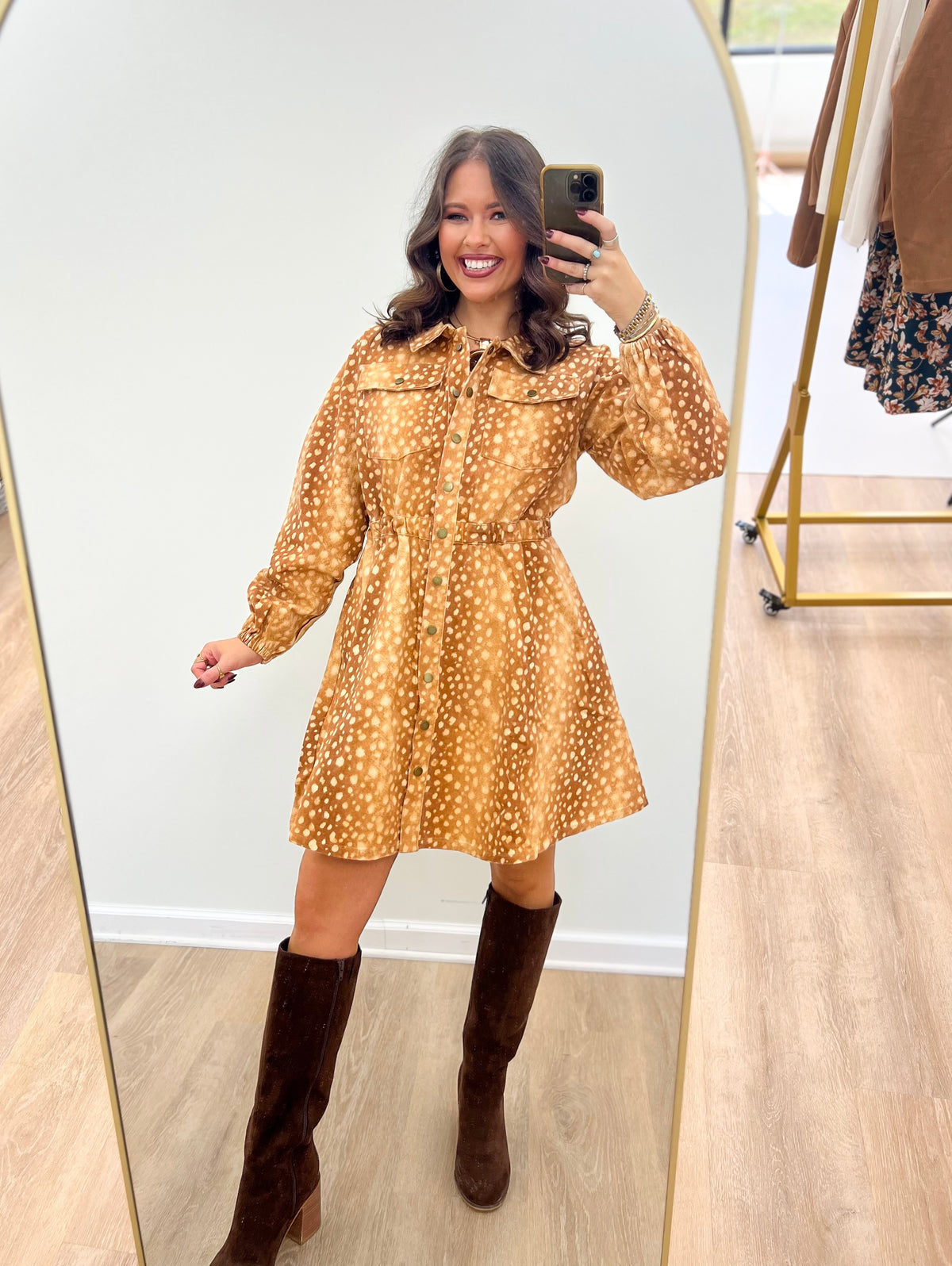 Bambi print button-down mini dress in brown, styled with tall dark boots