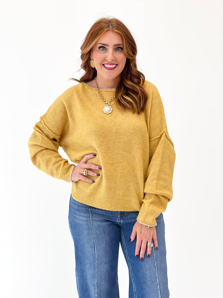 Honey mustard cashmere crewneck sweater, relaxed fit with ribbed hem and cuffs