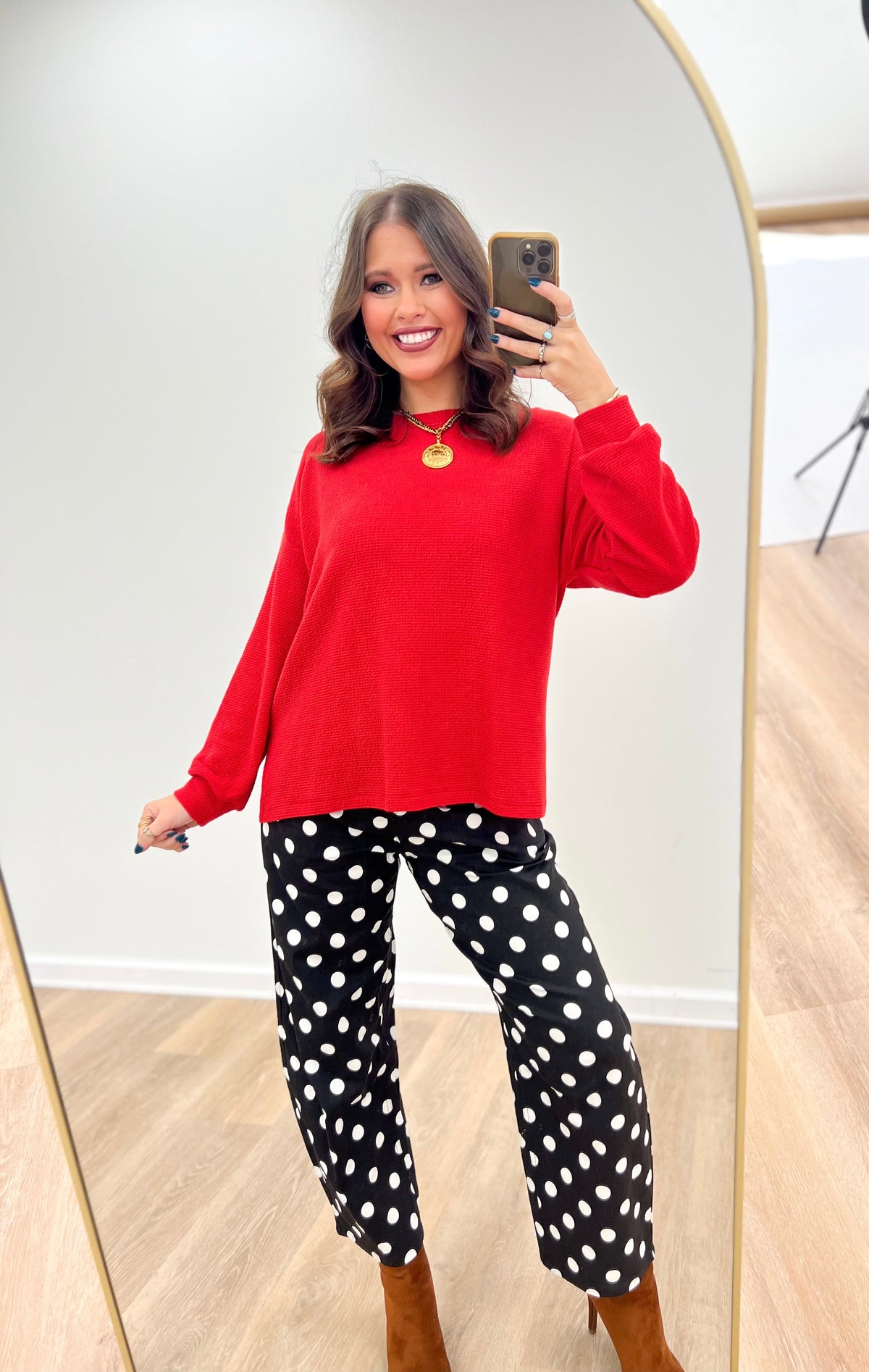 Red crew-neck long-sleeve knit top with longer hem