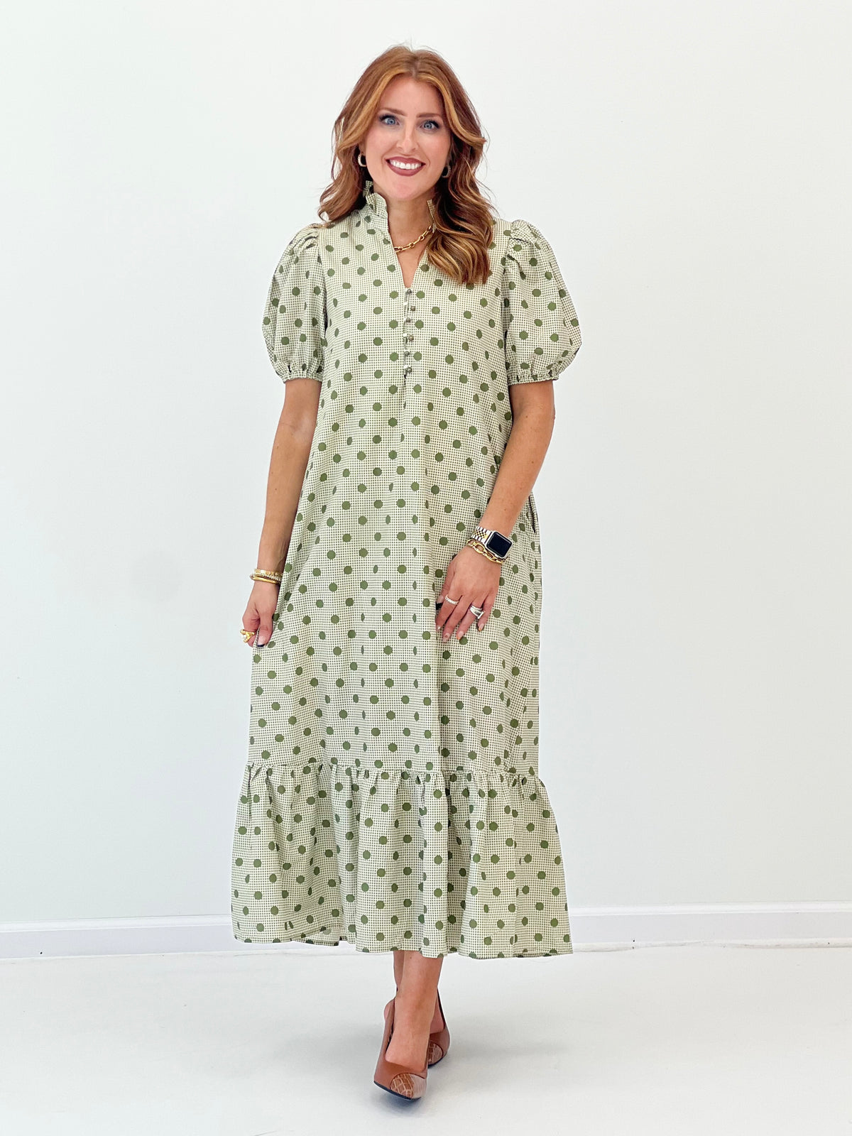 Olive polka dot V-neck maxi dress with gathered puff sleeves and layered ruffle bottom