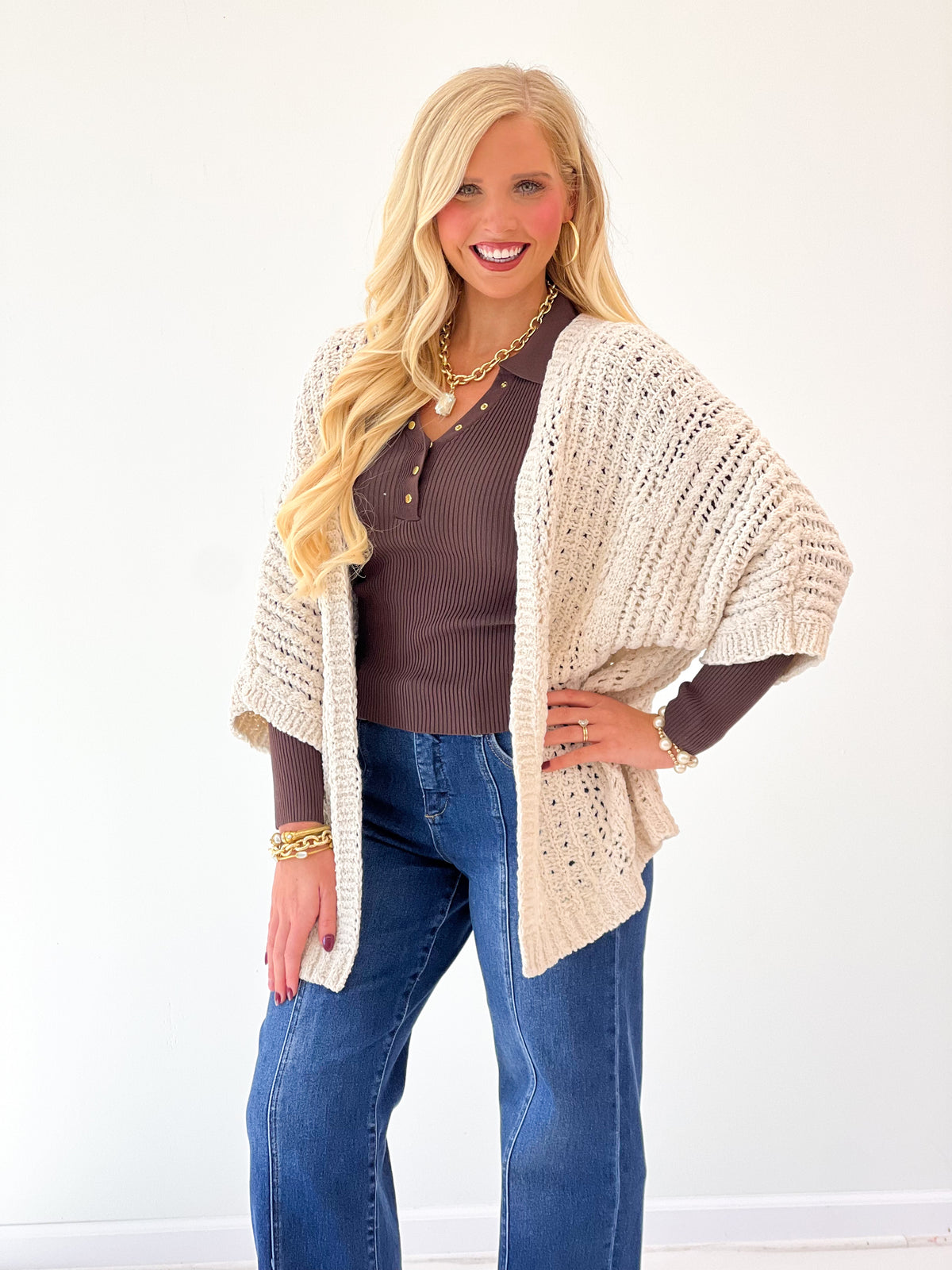 Oatmeal open-knit cardigan with long sleeves and textured open front