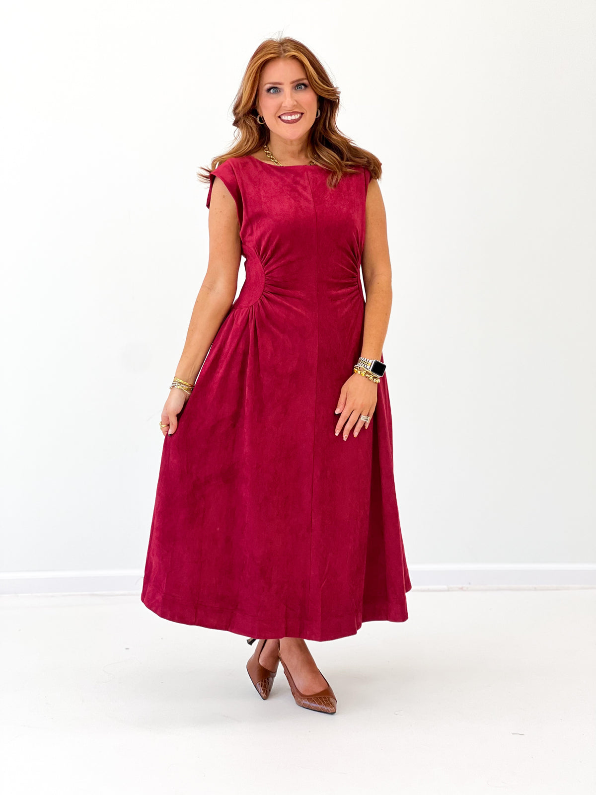 Burgundy faux suede side-panel midi dress, sleeveless and flared from waist