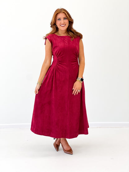 Burgundy faux suede side-panel midi dress, sleeveless and flared from waist