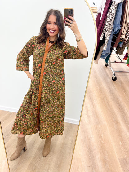 Olive patterned button-down midi dress with contrast trim and long sleeves