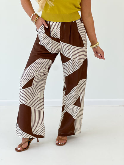 Brown and white stripe wide-leg pants with elastic waist and relaxed fit