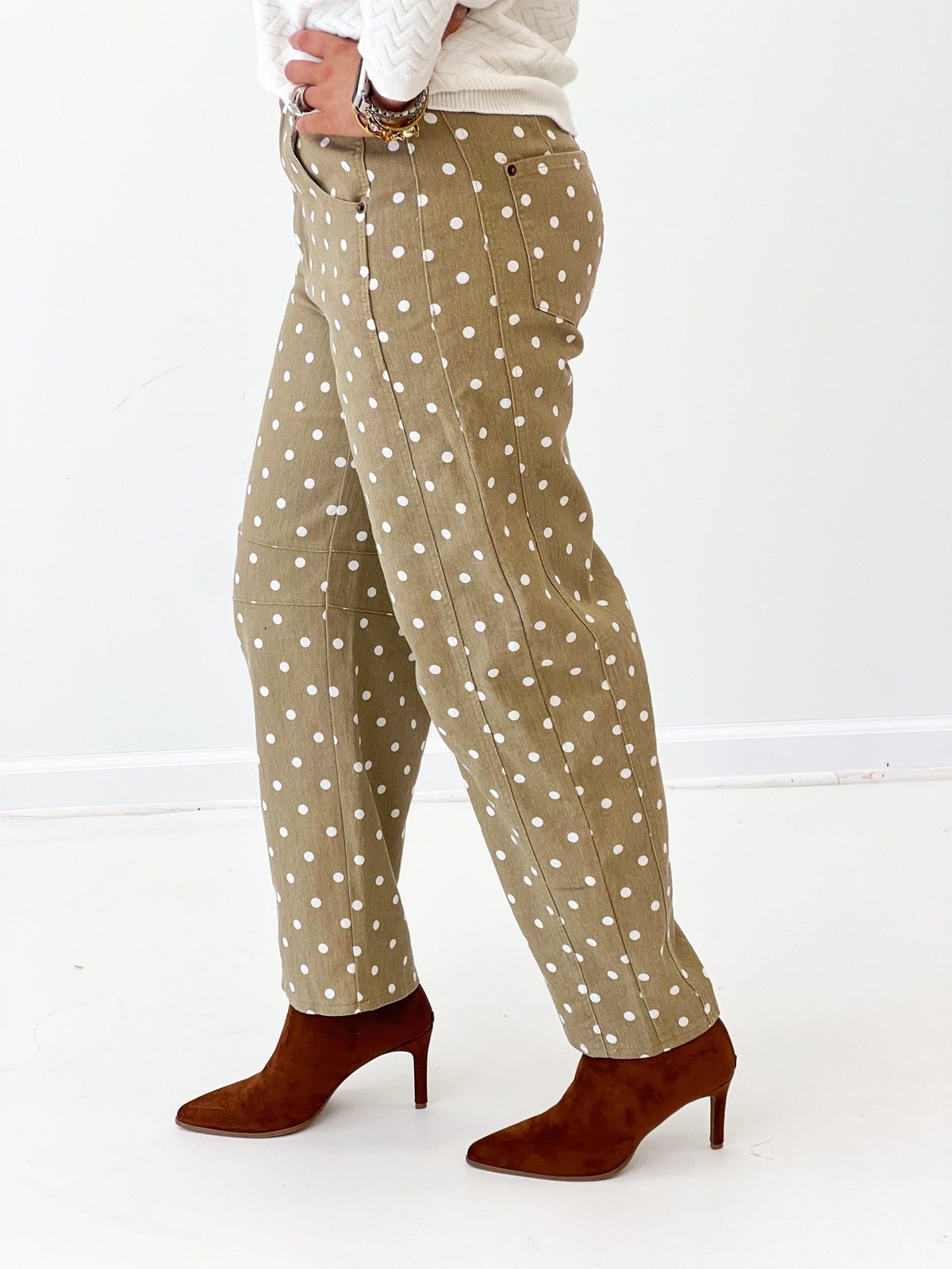 Women's olive polka dot barrel pants with tapered barrel leg and cuffs
