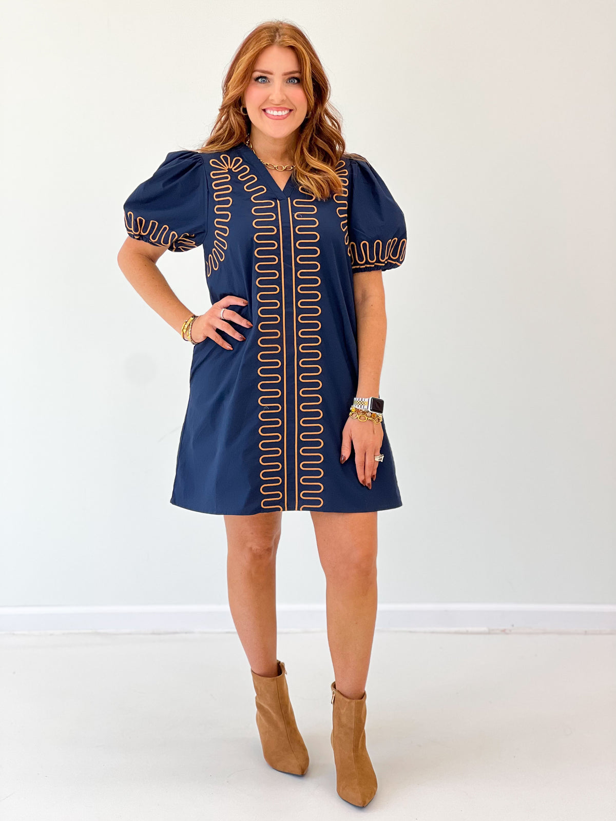 Navy short-sleeve embroidered shift dress with bold red vertical and side stripe design