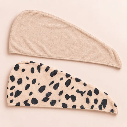CALA two-piece hair turban set with one solid beige wrap and one beige cheetah-print wrap.