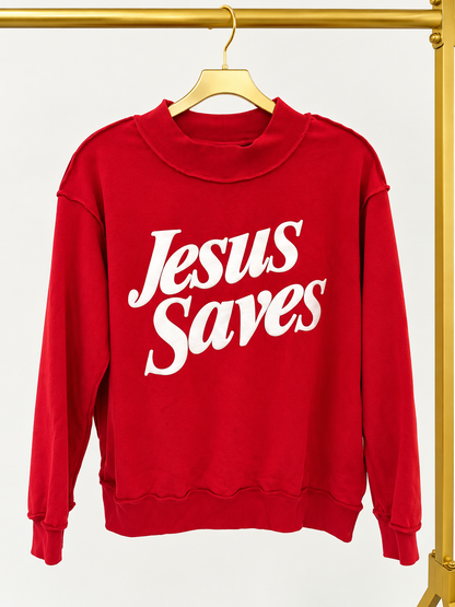 Red mock neck sweatshirt with white “Jesus Saves” print