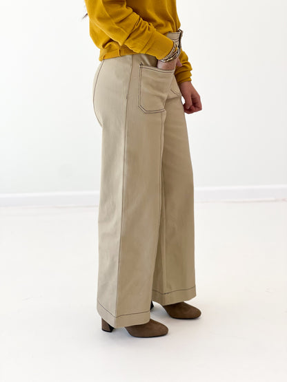 Entro bone pants, light tan wide-leg with side seams and back pocket detail