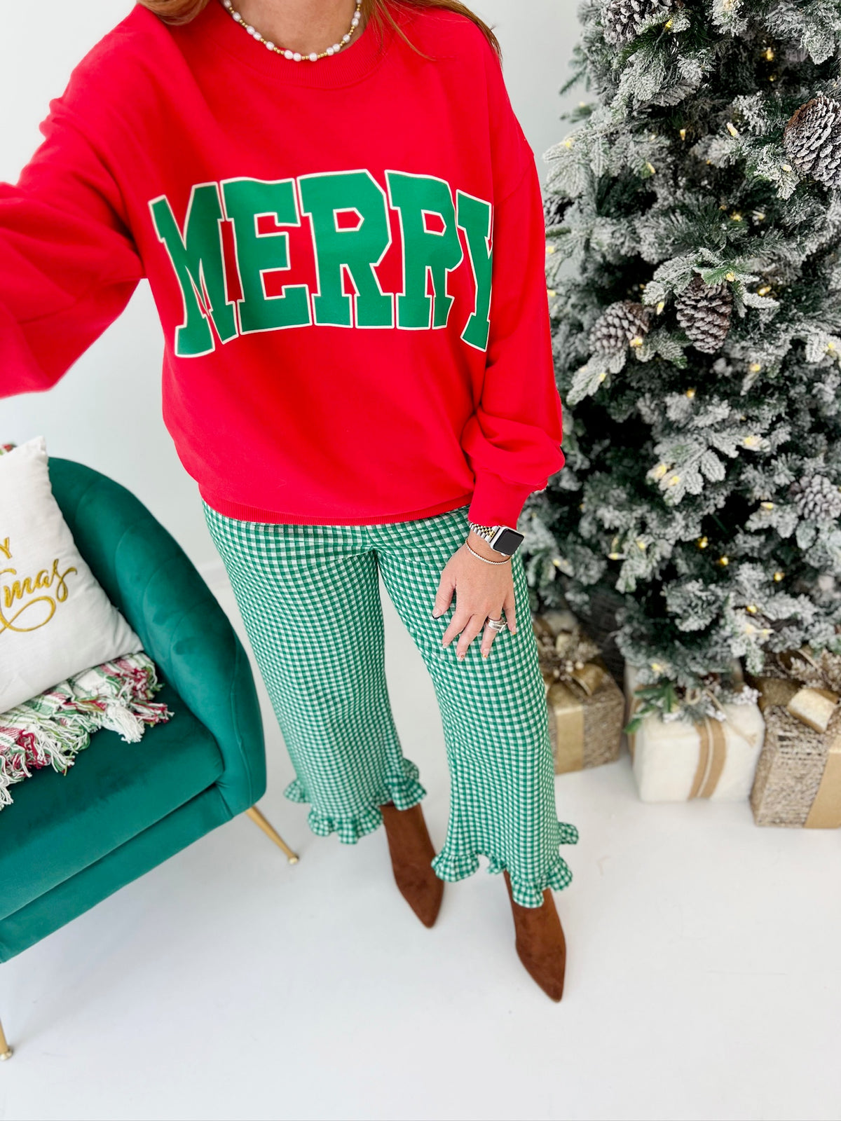 Red crewneck graphic sweatshirt top with green 'MERRY' lettering