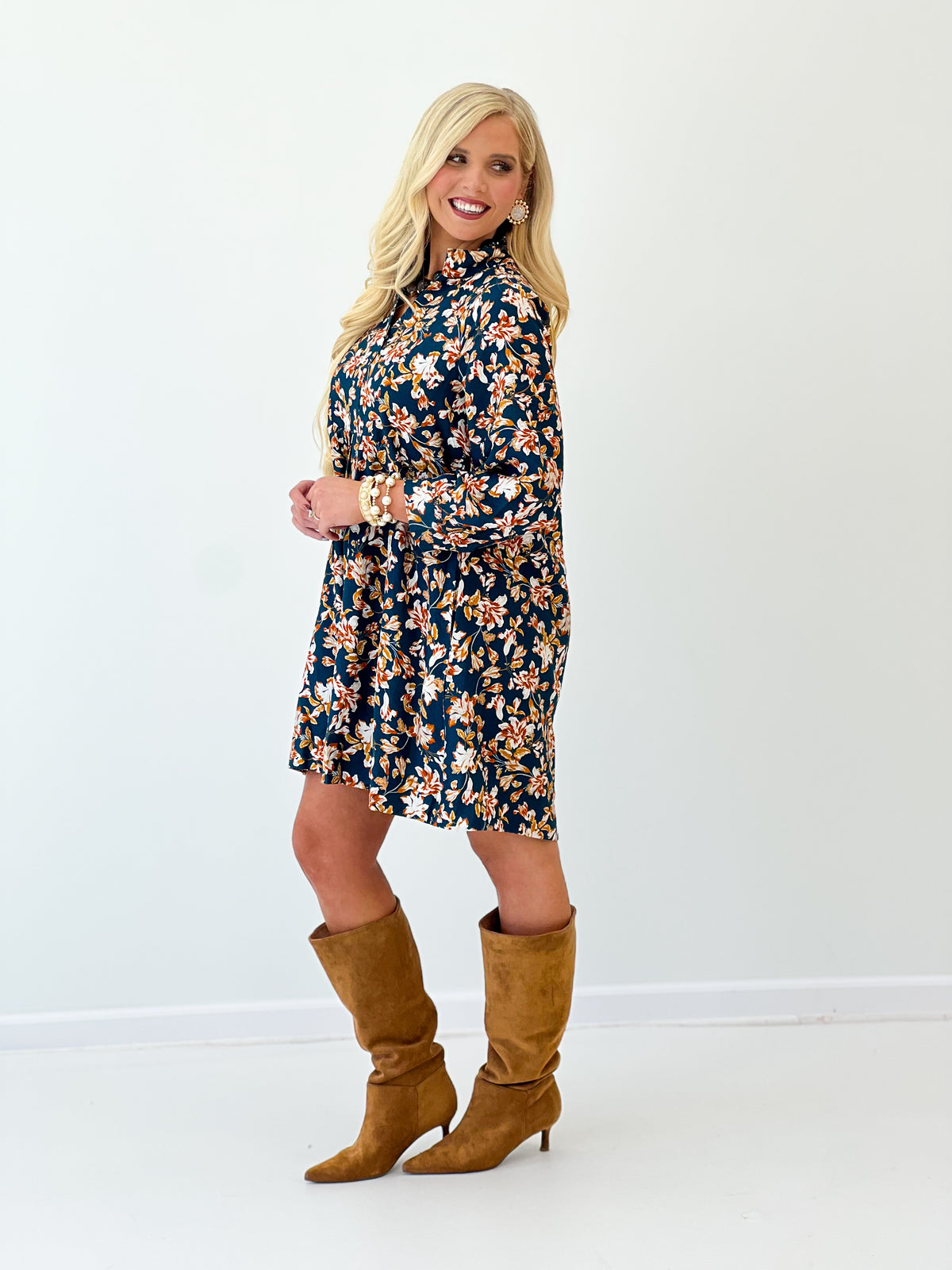 Teal floral V-neck long-sleeve baby doll dress with flared tiered skirt