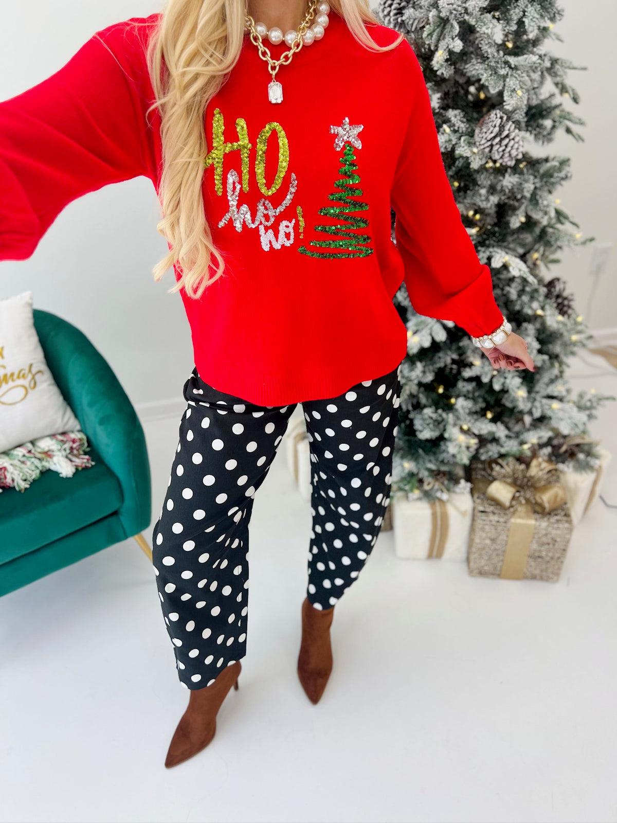 Red bubble-sleeve sweater with sequin holiday graphic on the front