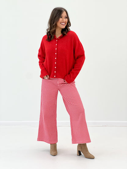 Red button-front long-sleeve cardigan with point collar and button placket