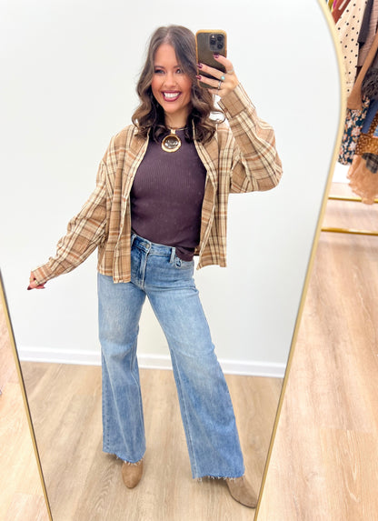 Mocha plaid button-up shirt with long sleeves and front buttons