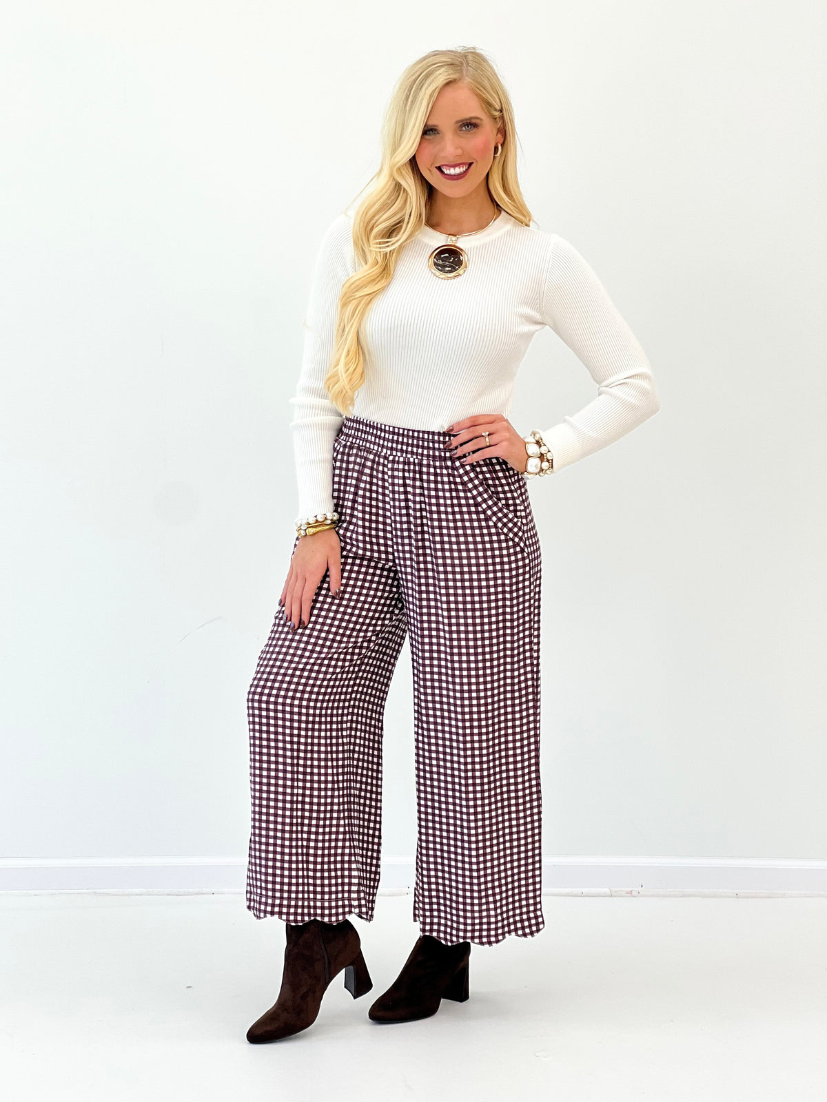 Red checkered wide-leg pants with elastic smocked waist and flowy wide legs