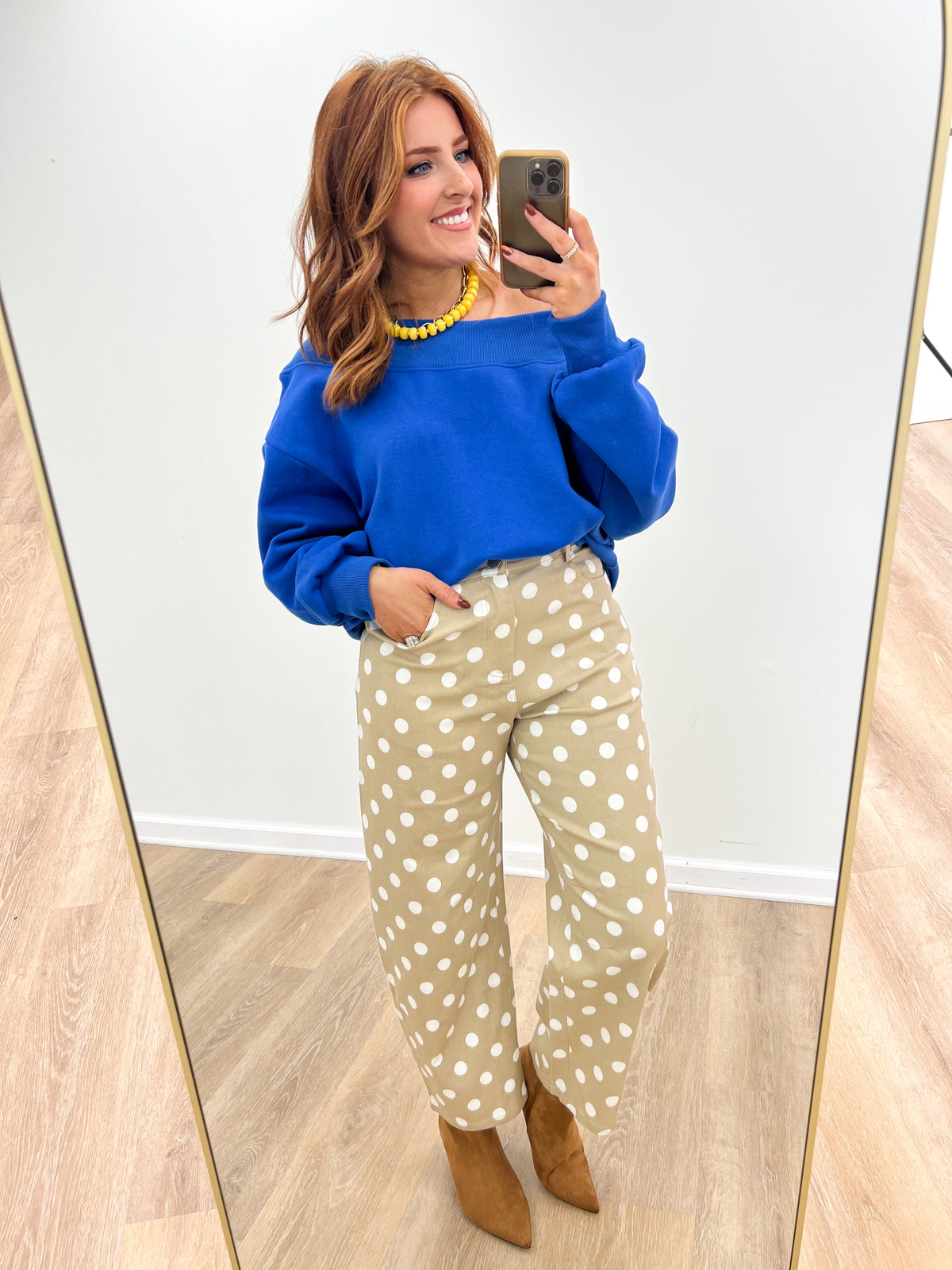 Blue off-shoulder sweatshirt with draped neckline and long sleeves