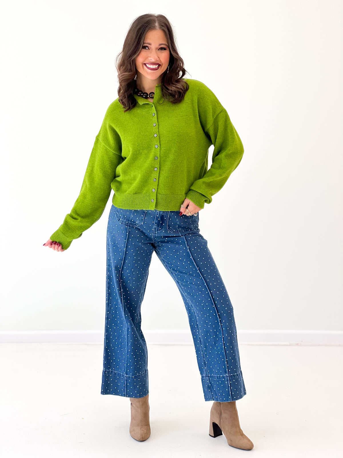 Pea green fold-over neck button-front sweater, buttoned placket