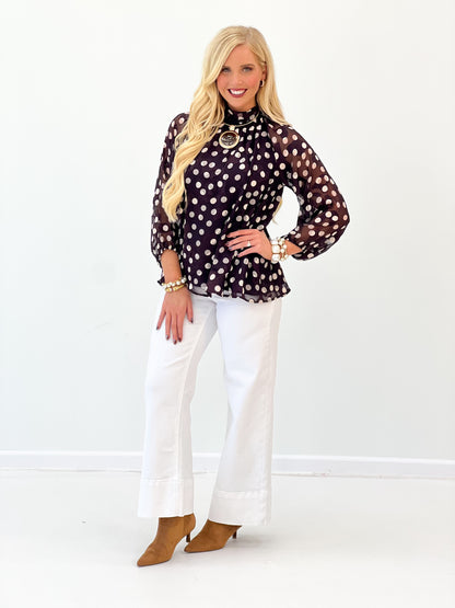 Black polka dot high-neck long-sleeve blouse with keyhole front detail