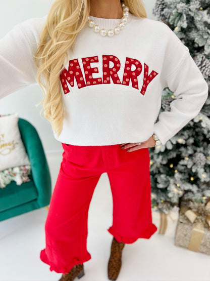 Off-white crewneck Christmas sweater with red 'MERRY' print and red detachable knit scarf