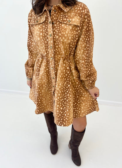 Close-up of bambi print button-down mini dress with collar and button placket, brown
